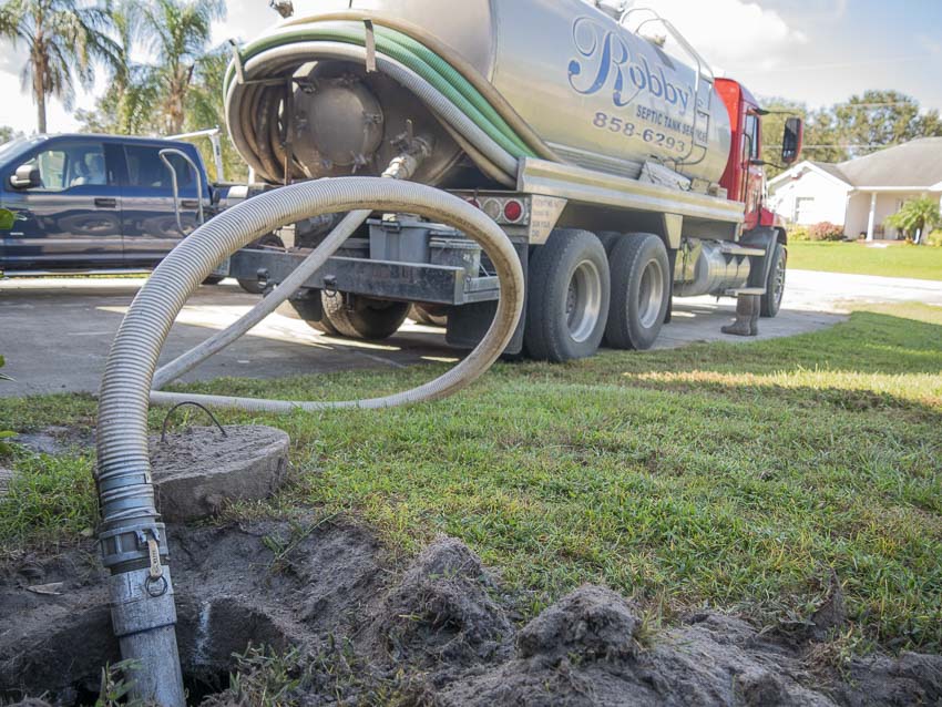 septic tank emptying costs routine service